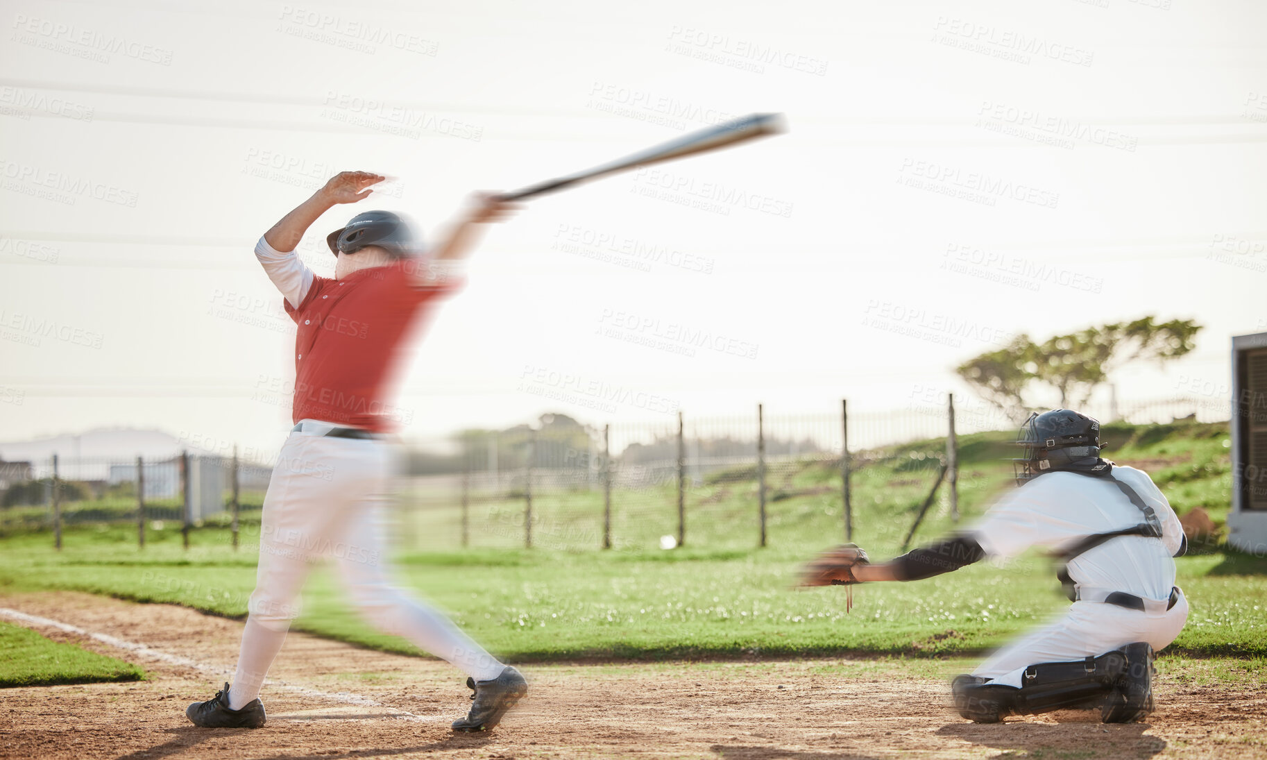 Buy stock photo Speed, hitting and men playing baseball, competitive sports and training on a field. Action, professional and player in motion while in a game of sport with a bat in a competition or match in a park