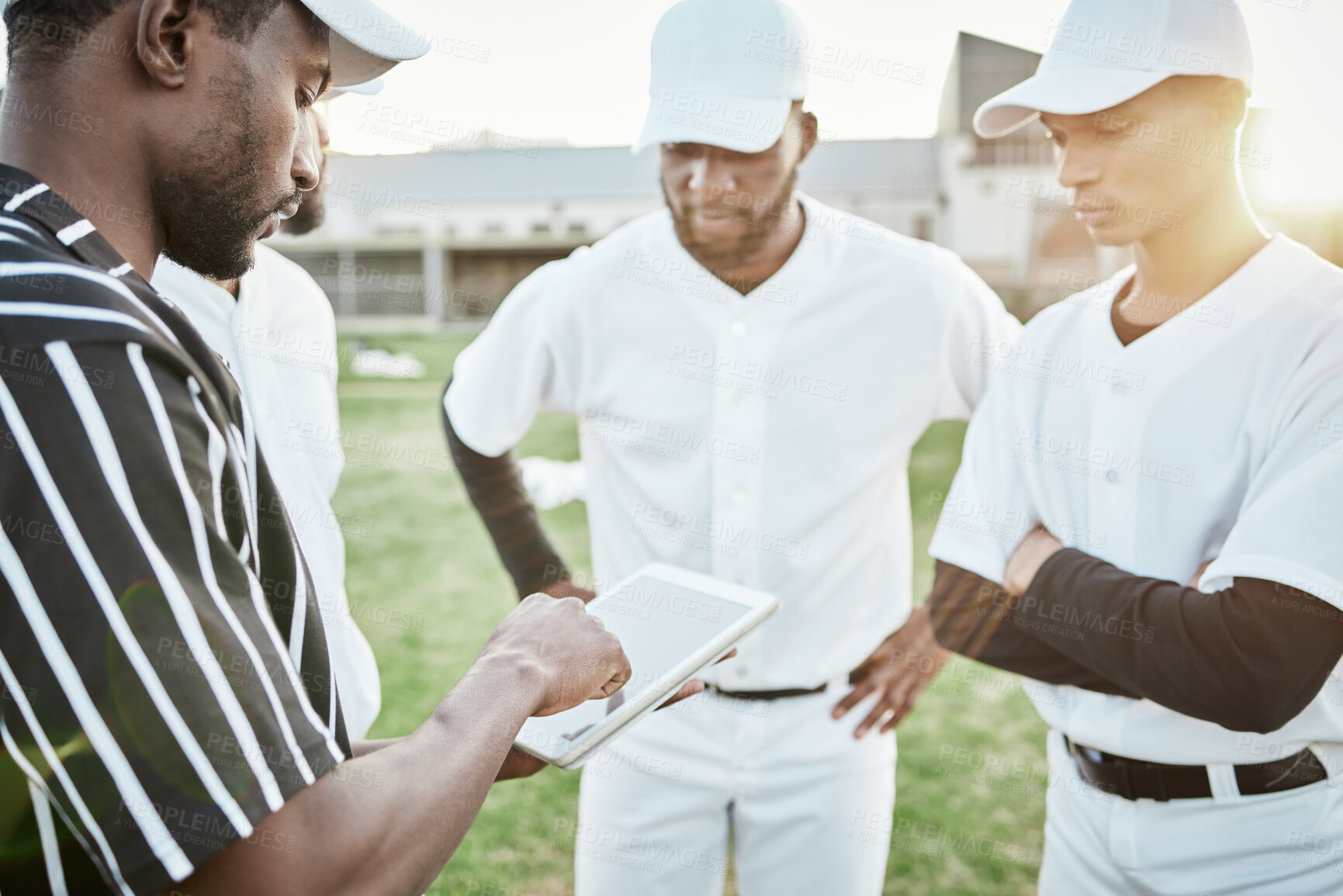 Buy stock photo Fitness, team and black man with coach, tablet and planning for training, competition and workout for wellness. Exercise, Nigerian male trainer and players on field, device and conversation for game