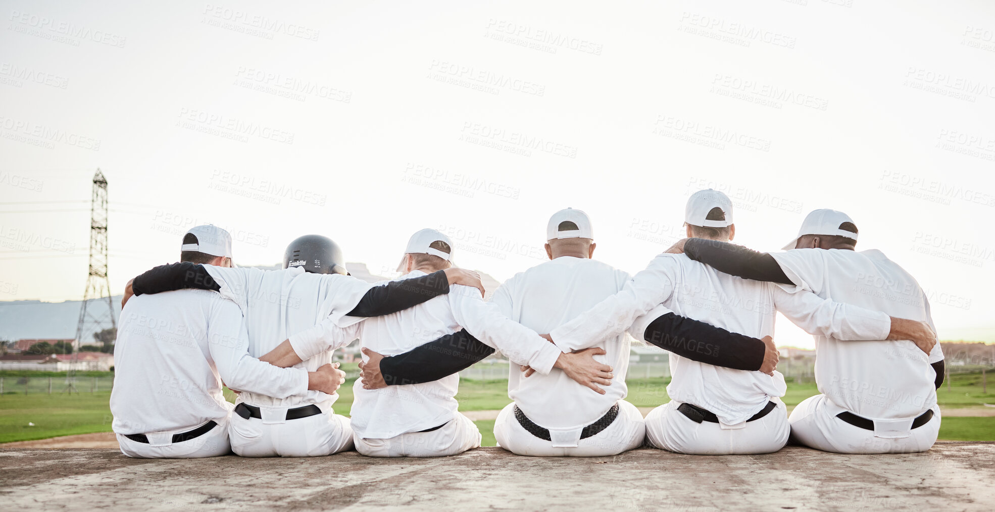 Buy stock photo Support, hug and back of men in baseball for motivation, solidarity and collaboration at a park. Teamwork, community and players sitting together for sport, training and hugging for sports on a field