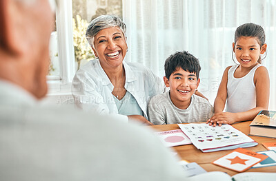 Buy stock photo Education, learning and grandmother bonding with grandchildren helping them with fun activities. Home school, smile and elderly woman spending time and sitting with kids outdoor of family home.