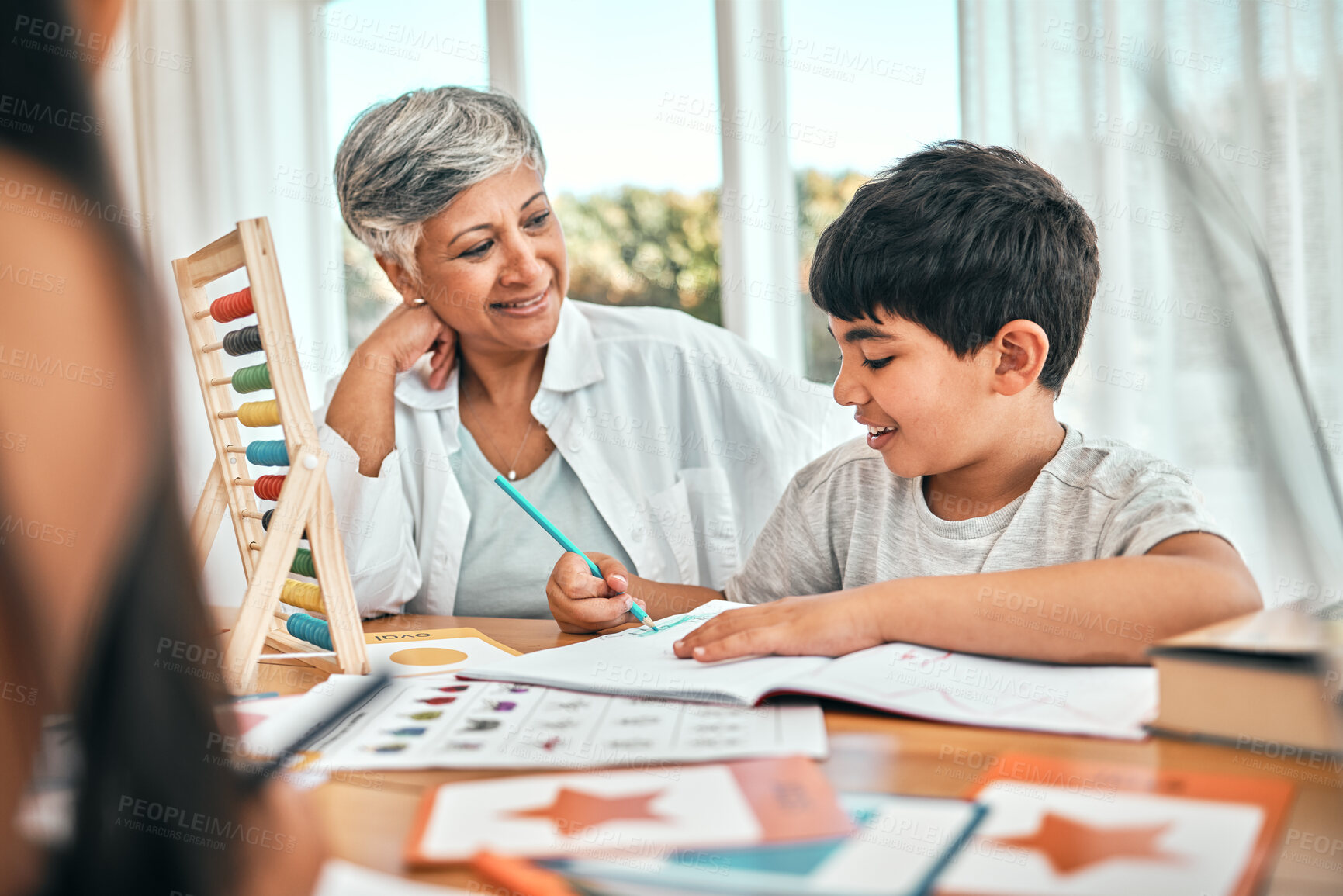 Buy stock photo Grandma, child learning selfie and home studying in a family house with education and knowledge. Senior woman, boy and teaching of elderly person with a kid doing writing for school homework 
