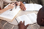 Bible, prayer group and people hands for religion support, faith and christian worship or spiritual connection. Holy book, reading and praying in diversity, community and hope of men and women