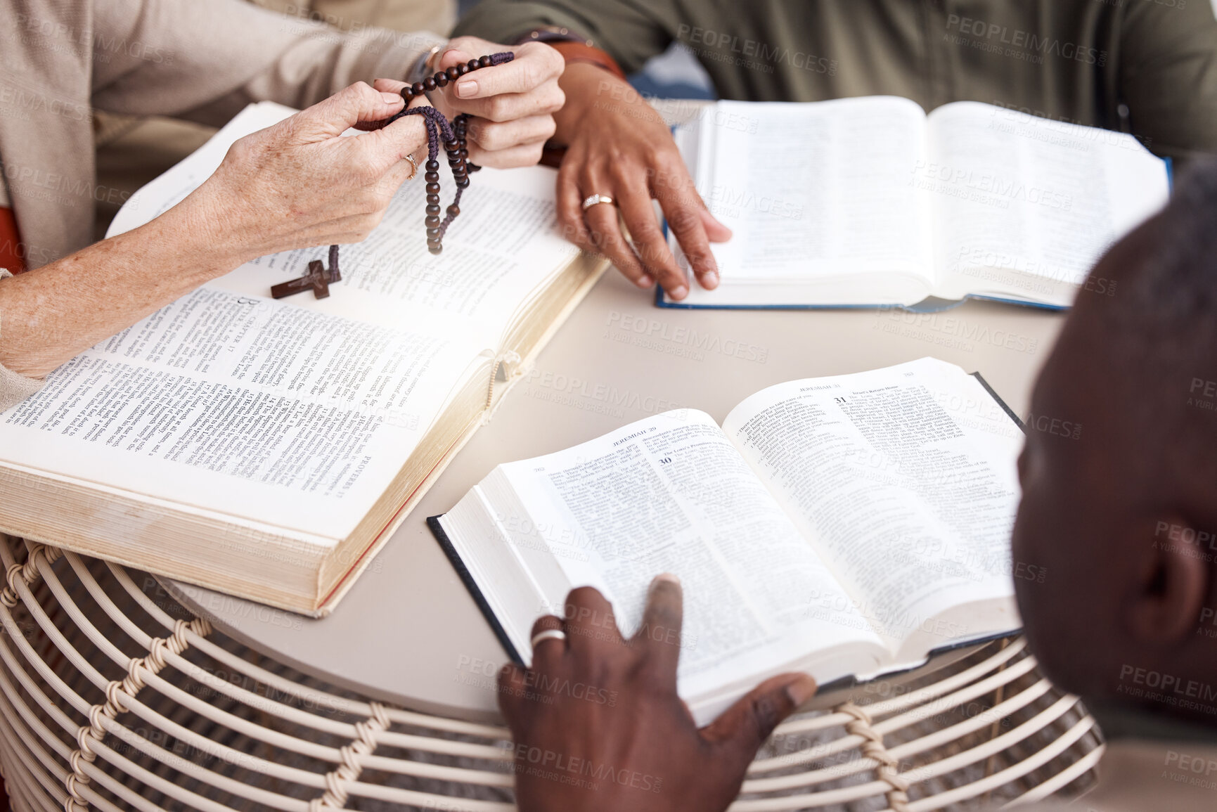 Buy stock photo Bible, prayer group and people hands for religion support, faith and christian worship or spiritual connection. Holy book, reading and praying in diversity, community and hope of men and women