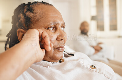 Buy stock photo Stress, divorce and elderly couple argue in their living room, frustrated and annoyed in their home. Marriage, crisis and senior woman with man in a lounge, fighting and moody after quarrel or issue