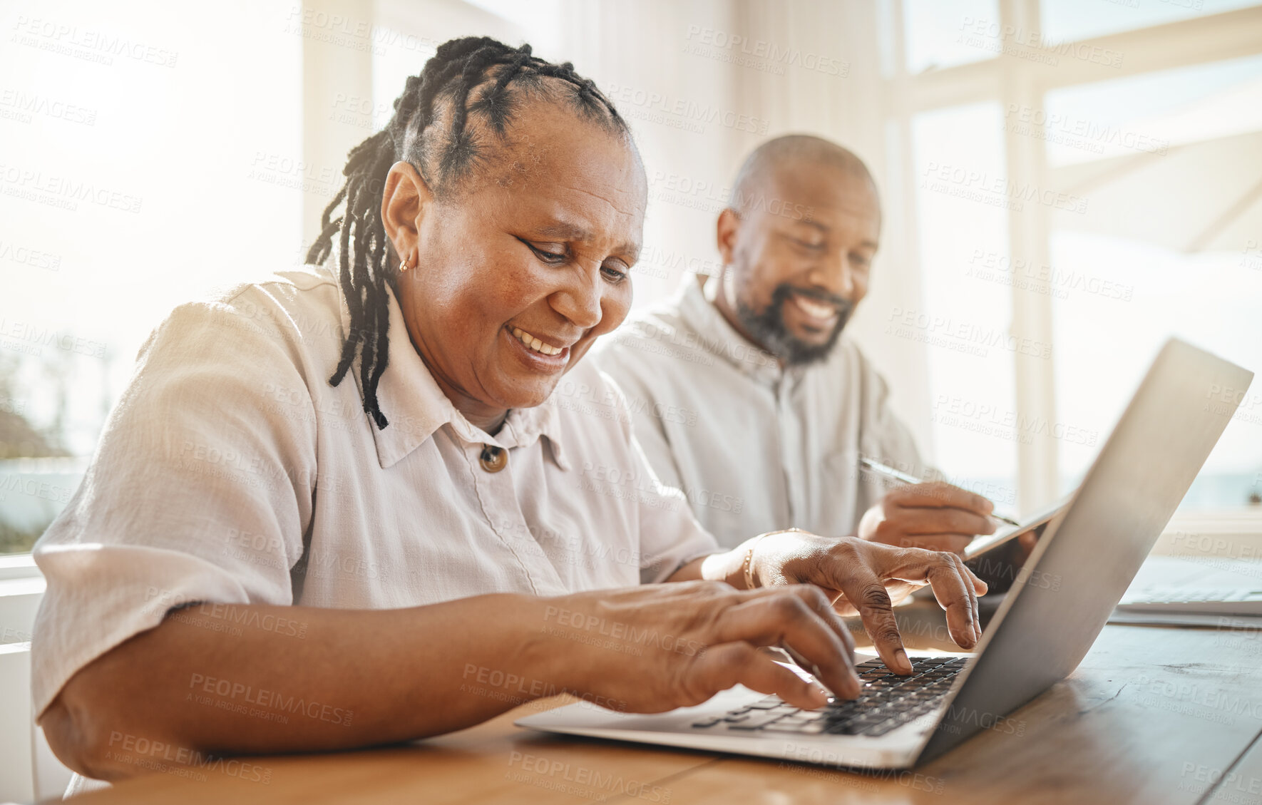 Buy stock photo Love, senior couple and budget in lounge, retirement and laptop with fintech, discussion and planning finance. Retired, black man and woman with device, conversation and check investments and savings