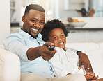 Black family, sofa and father with boy with tv remote for channel, streaming movies and watching film. Love, home and happy dad with child with television control for entertainment, cartoon and relax