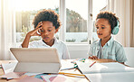 Digital tablet, headphones and children doing distance learning together in the dining room at home. Technology, home school and boy kids or brothers watching a class on mobile device in their house.