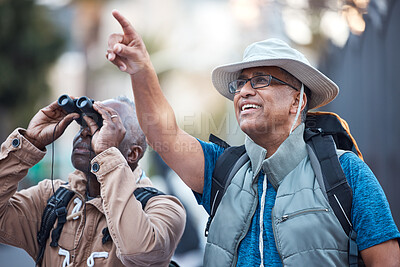 Buy stock photo Binoculars, city and men pointing outdoor for travel, explore vacation or tourist adventure walk. Happy friends, tourism and sightseeing search in sky, lens or journey direction of holiday experience