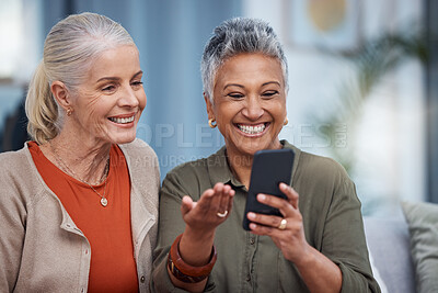 Buy stock photo Elderly women smile, phone social media and living room with senior females on web mobile. Video streaming, happiness and conversation at a house with old people together on technology at home