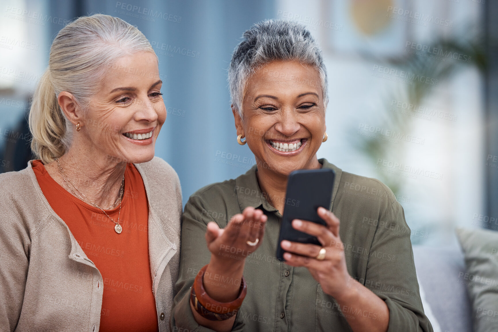 Buy stock photo Elderly women smile, phone social media and living room with senior females on web mobile. Video streaming, happiness and conversation at a house with old people together on technology at home