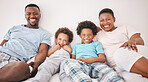 Black family, smile and portrait of parents with children on bed for bonding, quality time and relax together. Love, happy and African mom, dad and kids in bedroom enjoy morning, weekend and holiday