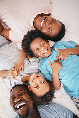 Buy stock photo Black family, bed portrait and top view with smile, happiness and kids with thumbs up with dad, mom and love. Happy children, parents and bedroom with bonding, care and support in morning for holiday
