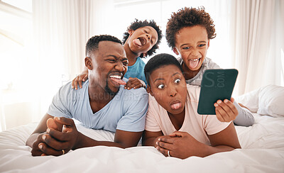 Buy stock photo Selfie, funny and black family on the bed with a tablet for communication, memory and comedy. Crazy, comic and African children taking a photo on tech with parents for bonding and quality time