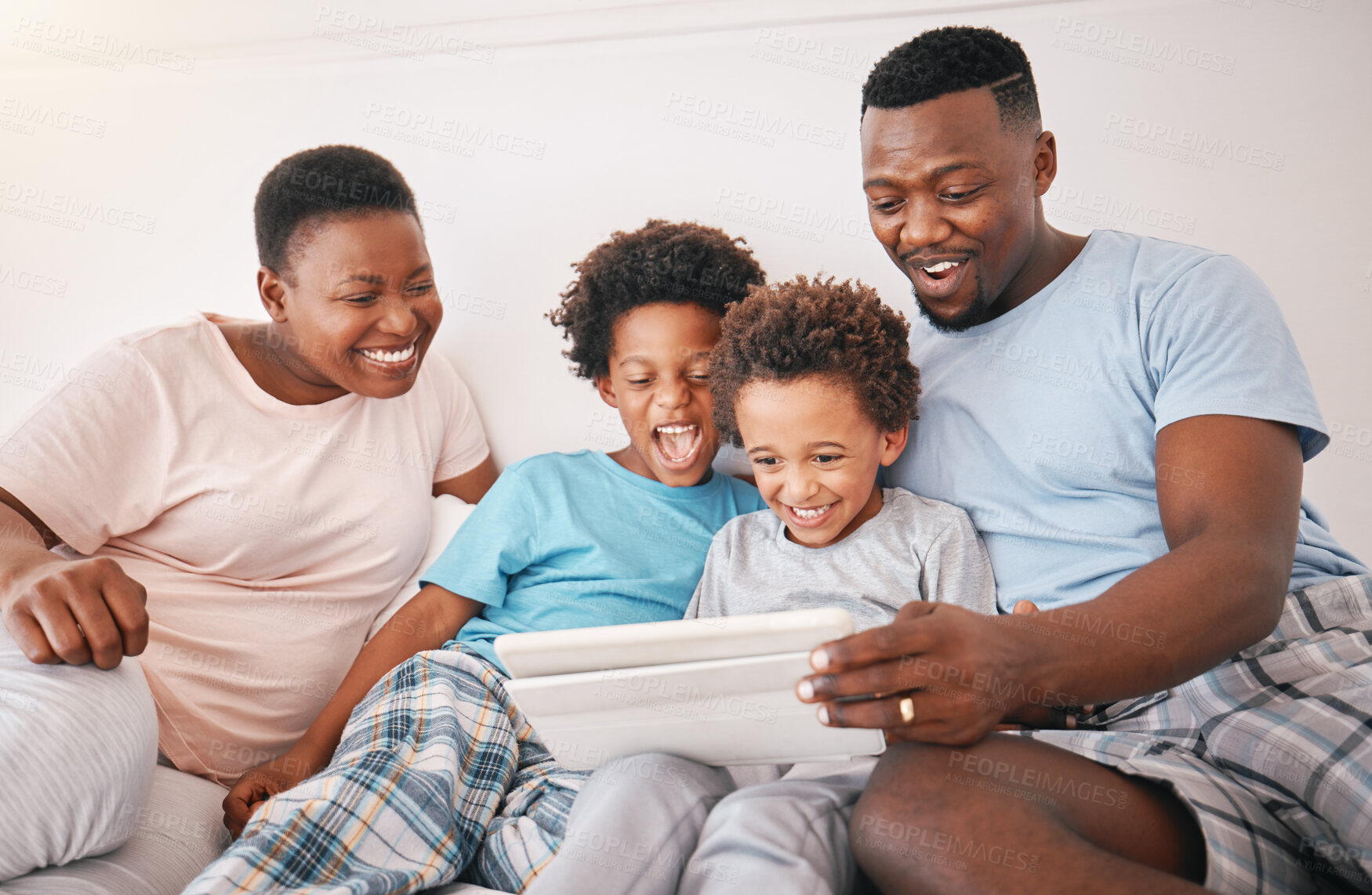 Buy stock photo Black family, tablet and kid video watching of a mother, dad and children in a home at morning. Digital app, online and child education app with a mama, boys and father together with happiness