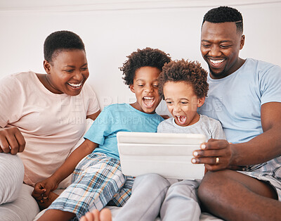 Buy stock photo Black family, tablet and excited kid game of a mother, dad and children in a home at morning. Digital app, online and child gaming app with a mama, boys and father together with laughing in house