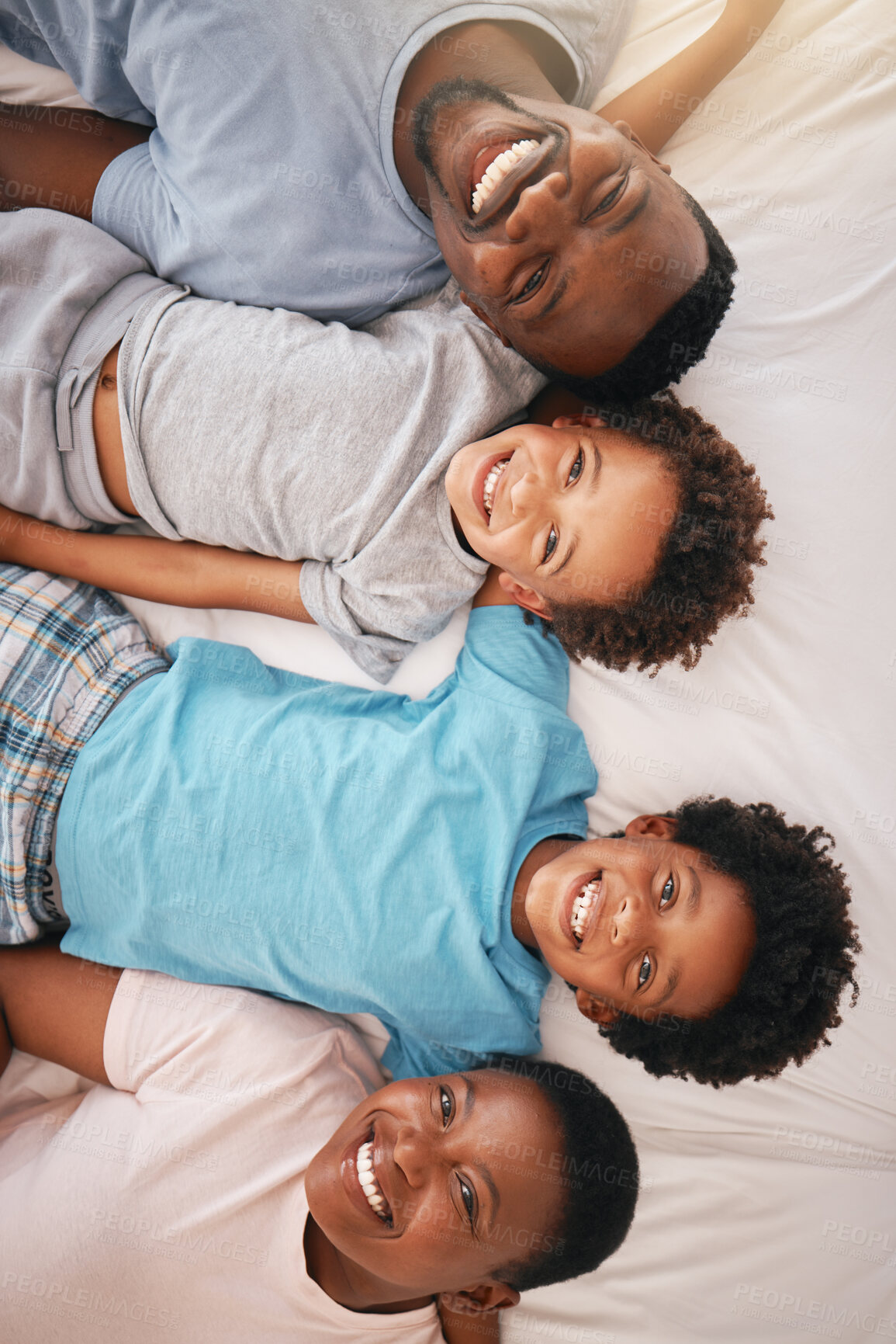 Buy stock photo Happy black family, bed portrait and top view with happiness, kids and together with dad, mom and love. African children smile, parents and bedroom for bonding, care or support in morning for holiday
