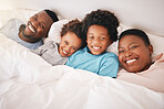 Smile, happy and relax with black family in bedroom for bonding, wake up and morning routine from top view. Care, funny and cute with parents and children at home for calm, weekend and quality time 