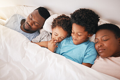 Buy stock photo Sleeping, black family and children with parents in a bed feeling tired in the morning. Bonding, parent love and support with kids, dad and mother resting at home in a house bedroom together
