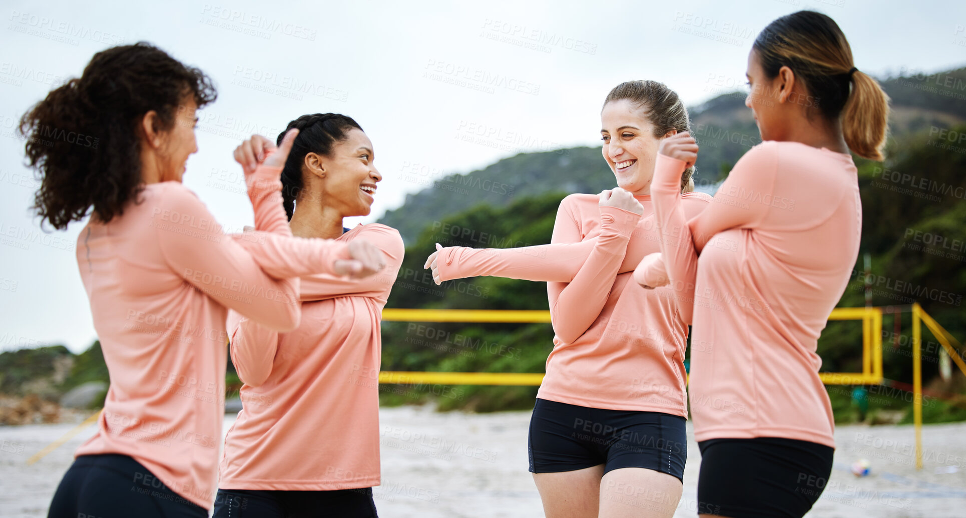 Buy stock photo Volleyball, team and women stretching on beach excited to play match, competition and sport game. Teamwork, fitness and happy female players stretch arms for warm up practice, training and exercise