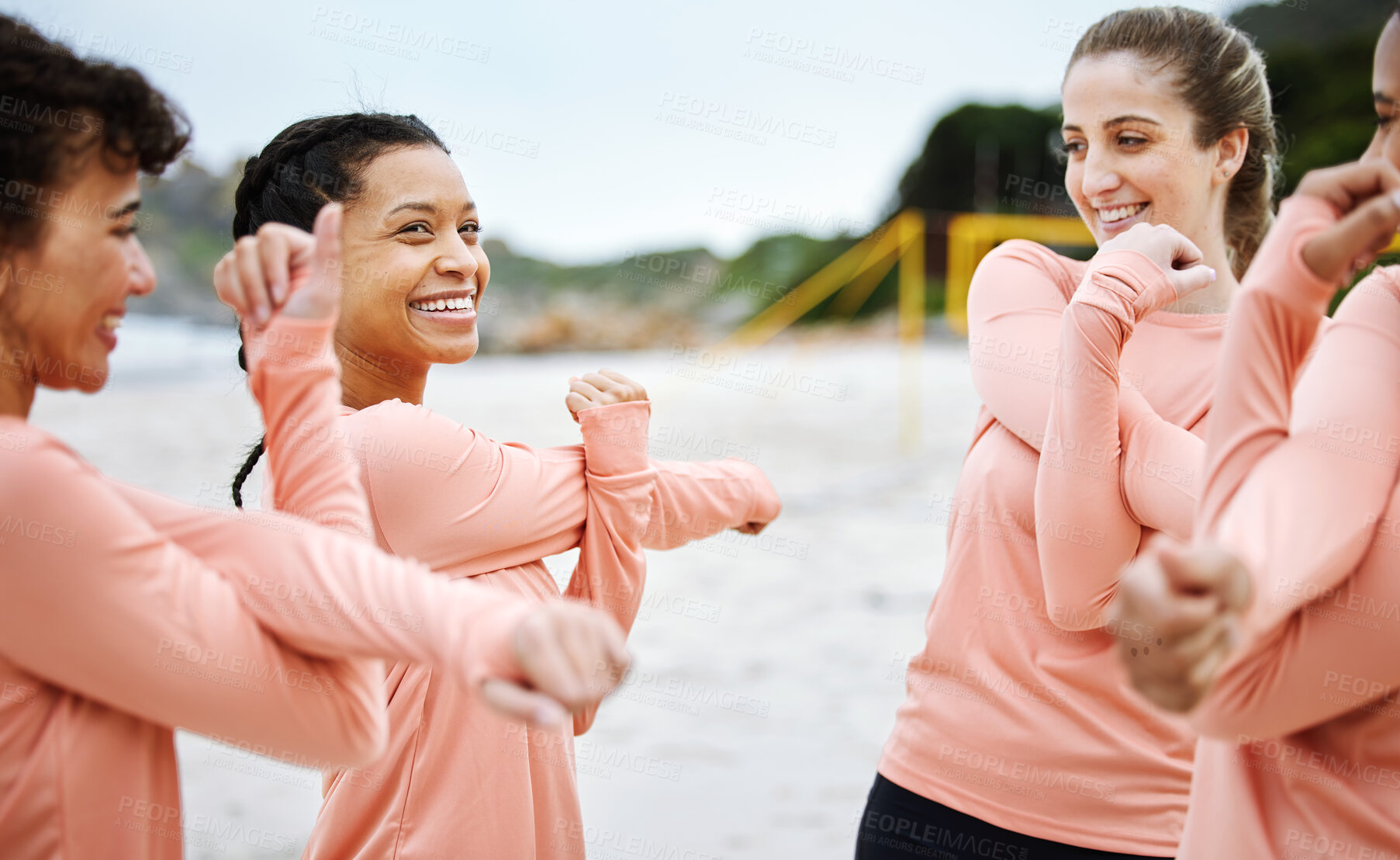 Buy stock photo Women, volleyball and team stretching on beach excited to play match, competition and sports games. Teamwork, fitness and happy female players stretch arms for warm up, training and exercise on sand