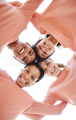 Buy stock photo Happy, diversity and portrait of females in circle from bottom with partnership, unity and community. Happiness, smile and women friends laughing, bonding and standing together by a white background.