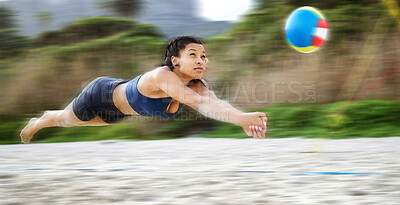 Beach volleyball, diving or sports girl playing a game in training or fitness workout in summer. Air jump, blurry dive action or active woman on sand in a fun competitive match in Sao Paulo, Brazil