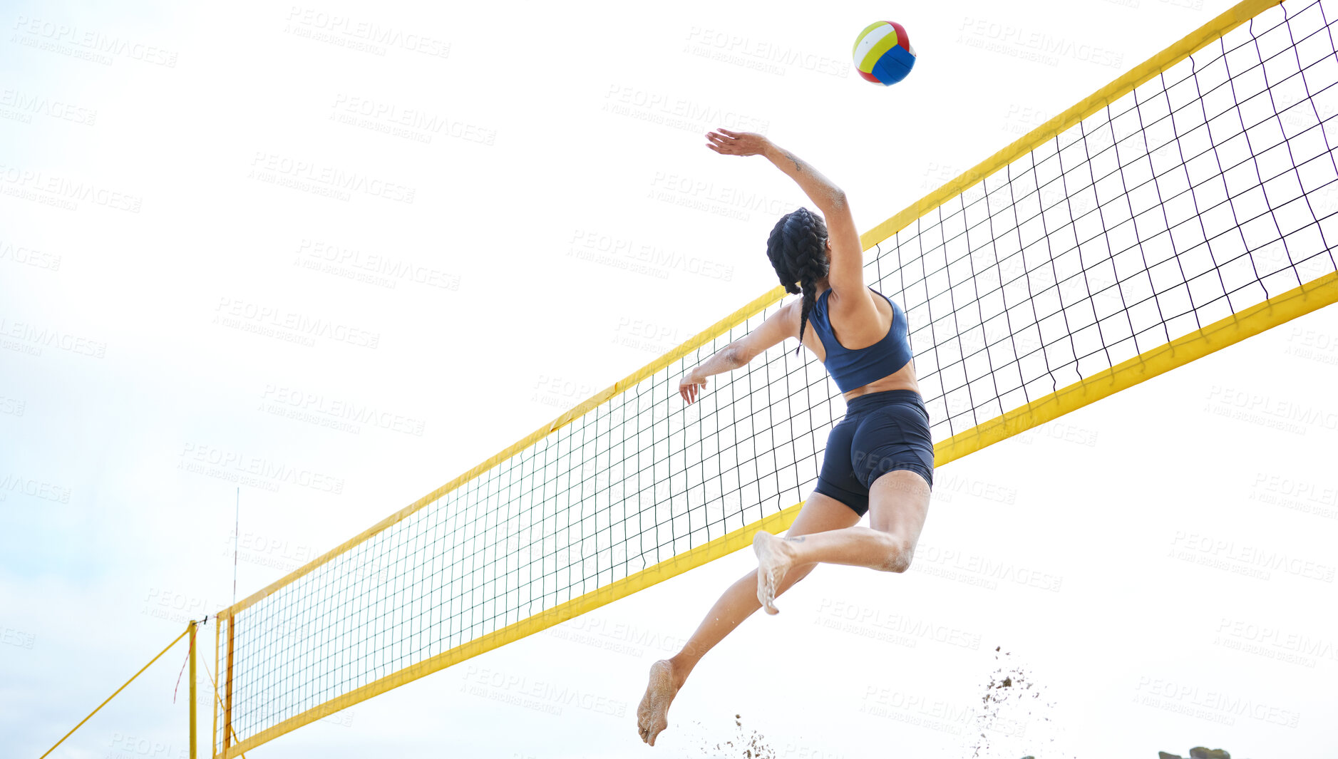 Buy stock photo Sports, volleyball and woman jump at beach to hit ball in competition, game or match. Training, exercise and female athlete jumping for spike in tournament for workout, fitness and health at seashore