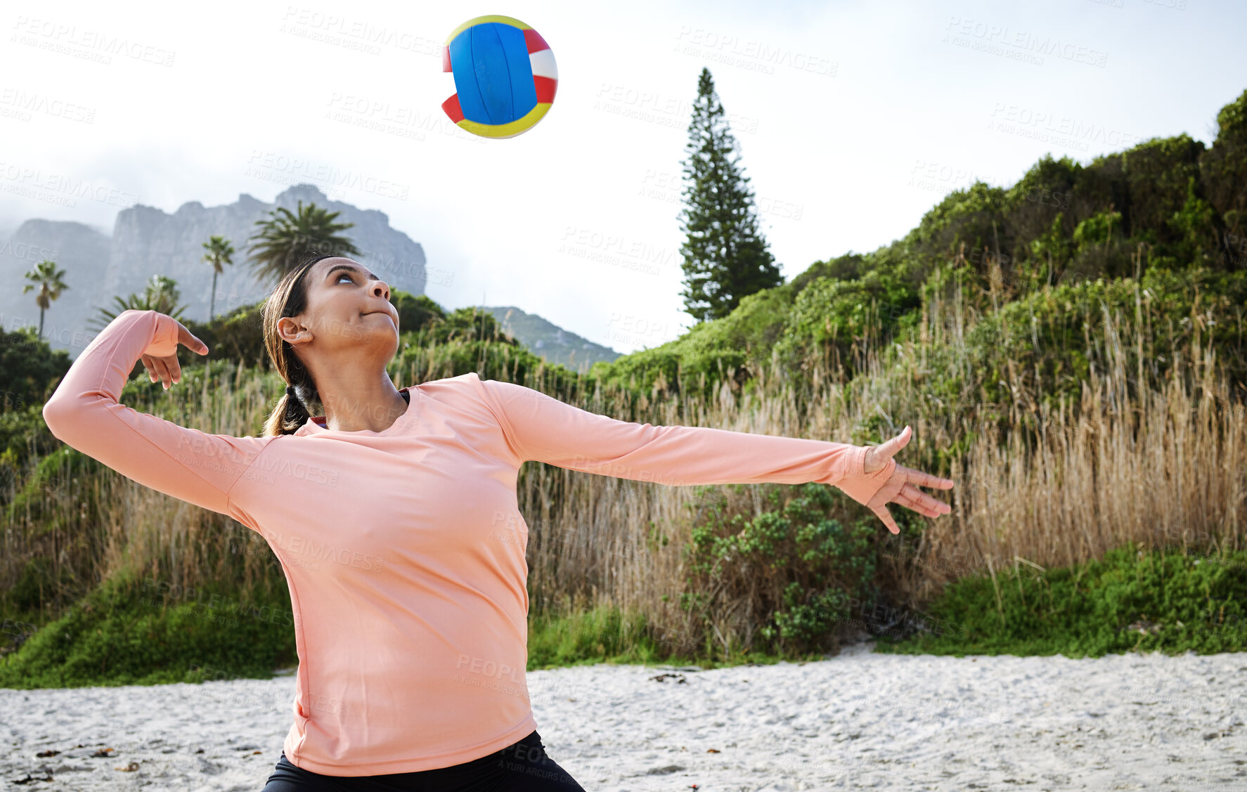 Buy stock photo Volleyball, beach and spike with a sports woman playing a game outdoor in nature alone for recreation. Fitness, exercise and training with a female athlete hitting a ball during a match on the coast