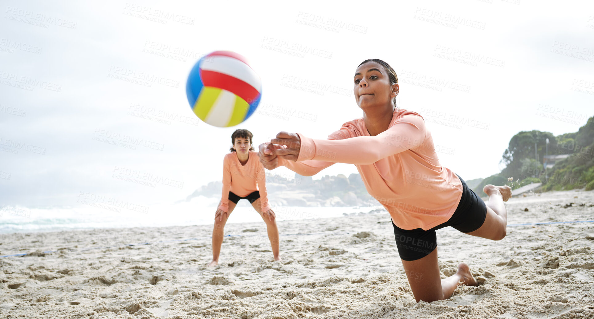 Buy stock photo Volleyball, sports and teamwork of women at beach hitting ball in competition, game or match mockup. Training, exercise and girls, players or friends play for workout, fitness and health at seashore.