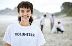 Smile, portrait and volunteer woman at beach for cleaning, recycling or environmental sustainability. Earth day, happy face and proud female for community service, charity and climate change at ocean