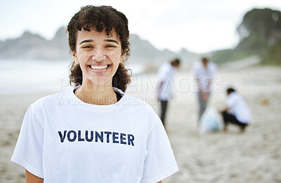 Buy stock photo Smile, portrait and volunteer woman at beach for cleaning, recycling or environmental sustainability. Earth day, happy face and proud female for community service, charity and climate change at ocean