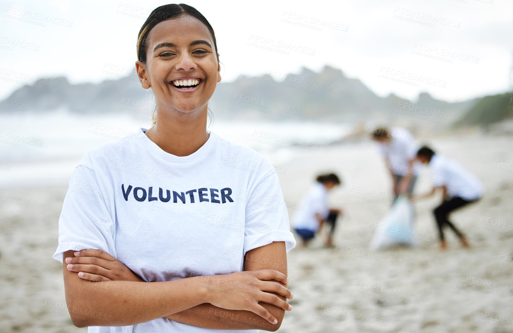 Buy stock photo Smile, portrait and volunteer woman at beach for cleaning, recycling and sustainability. Earth day, laughing and proud female with arms crossed for community service, charity and climate change.