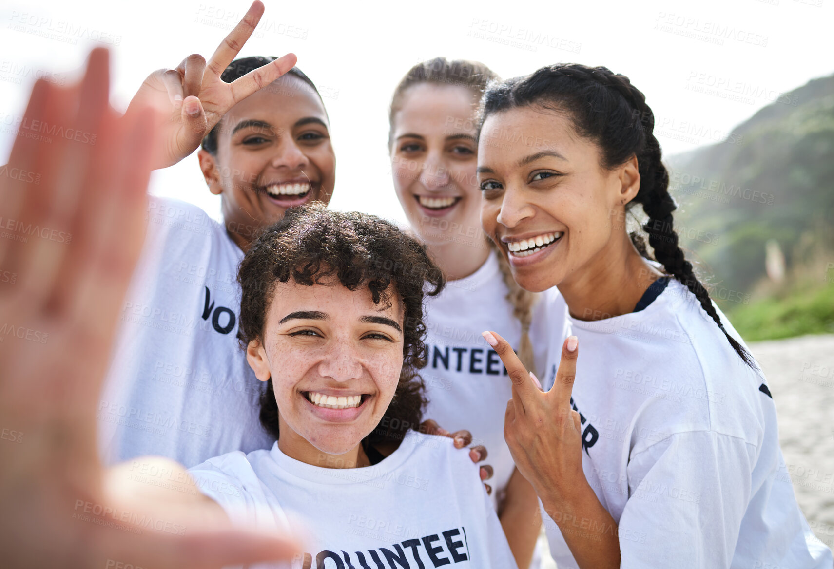 Buy stock photo Peace sign, selfie and volunteer women at beach taking photo for earth day, environmental sustainability or recycling. V emoji, community service and group portrait of happy girls or friends laughing