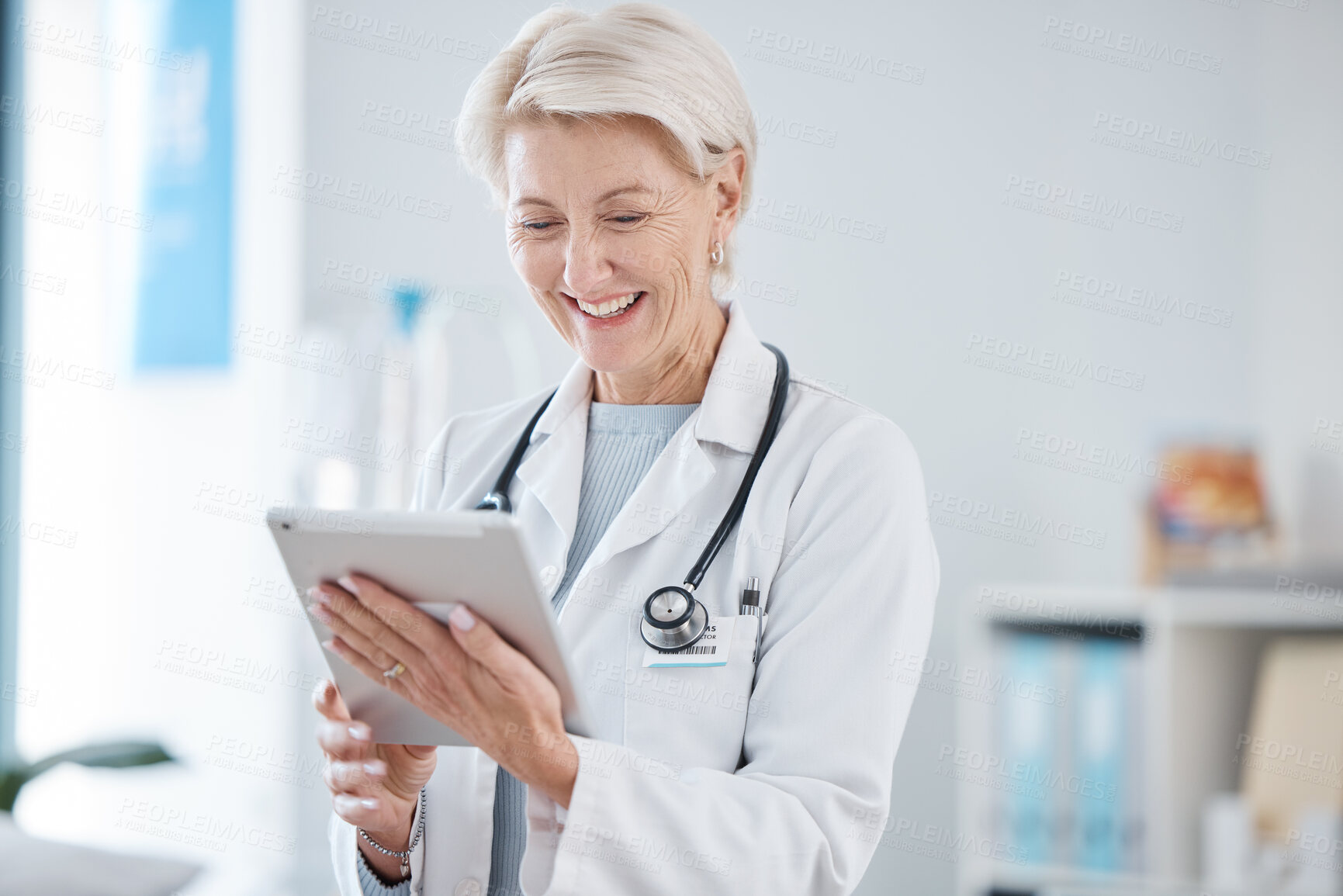 Buy stock photo Healthcare, tablet and senior doctor smile in hospital for online consulting, telehealth and wellness app. Clinic, insurance and woman on digital tech for internet, medical research or patient data