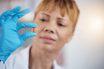 Buy stock photo Pharmacist, pharmacy and hands of woman with pills, medication or antibiotics in drugstore. Healthcare, wellness and medical doctor look, check or quality inspection of drugs, medicine or supplements