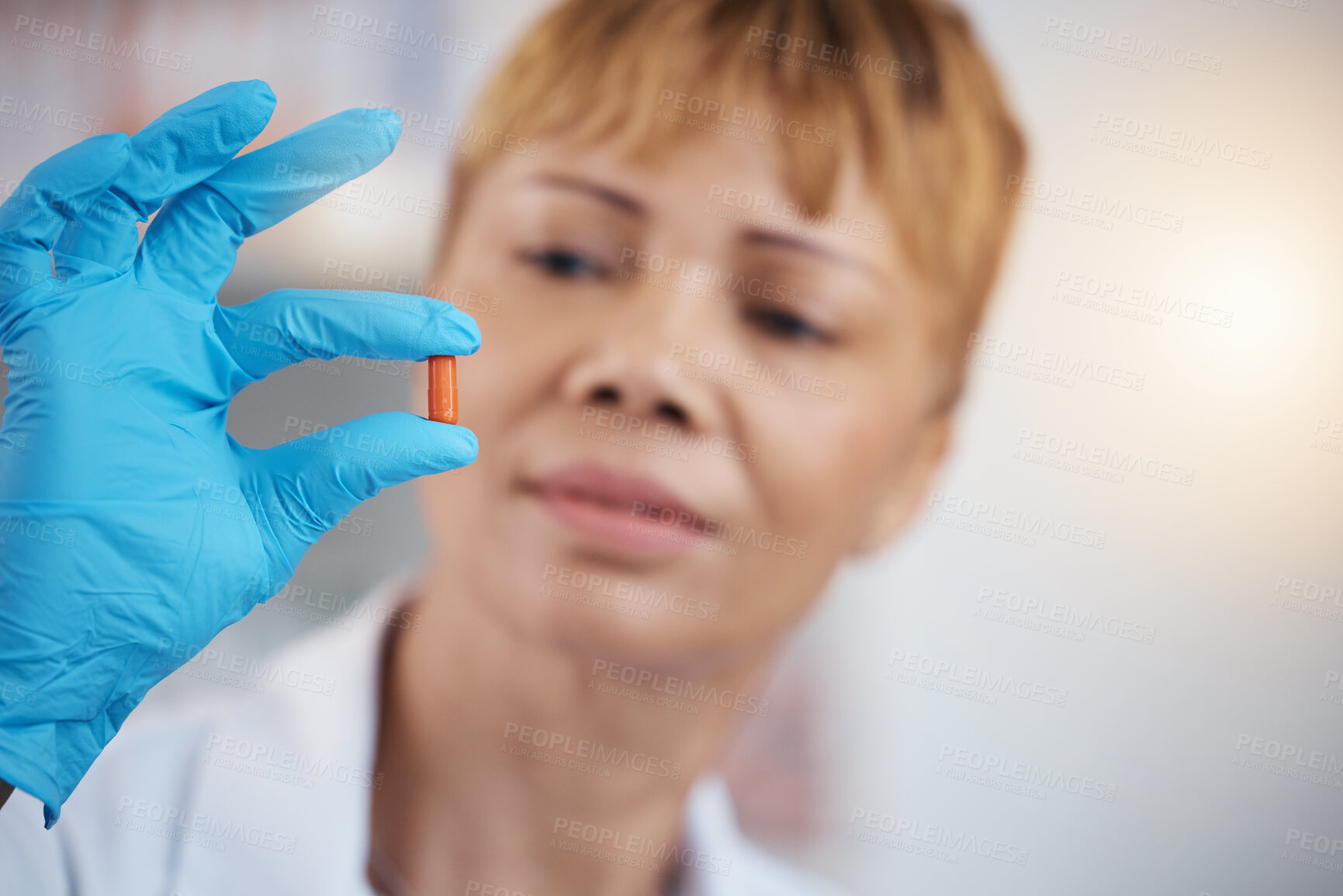 Buy stock photo Pharmacist, pharmacy and hands of woman with pills, medication or antibiotics in drugstore. Healthcare, wellness and medical doctor look, check or quality inspection of drugs, medicine or supplements