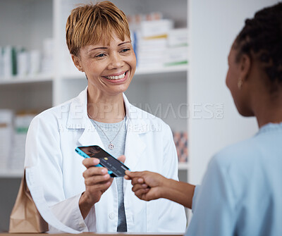 Buy stock photo Pharmacy, pharmacist and credit card payment of customer for medication, medicine or product in store. Senior healthcare, fintech smile and happy woman shopping for medical drugs with pos machine.