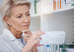 Pharmacy, pharmacist and woman reading medicine label, pills or box in drugstore. Healthcare, thinking and elderly medical doctor looking at medication, antibiotics or drugs, vitamins or supplements.