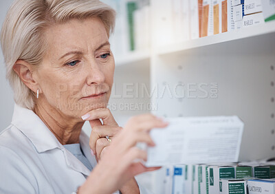 Buy stock photo Pharmacy, pharmacist and woman reading medicine label, pills or box in drugstore. Healthcare, thinking and elderly medical doctor looking at medication, antibiotics or drugs, vitamins or supplements.
