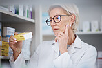 Pharmacy, pharmacist and woman reading medication label, pills or box in drugstore. Healthcare, wellness and elderly medical doctor looking at medicine, antibiotics or drugs, vitamins or supplements.
