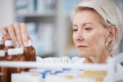 Buy stock photo Senior woman, pharmacist and medical stock check in a pharmacy for drug information. Healthcare, wellness and working elderly person with pharmaceutical drugs reading bottle product ingredients