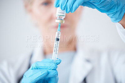 Buy stock photo Healthcare, vaccine and woman doctor with syringe in hands, for vaccination or shot in hospital. Zoom, needle and bottle, science with medical innovation for virus protection and safety in medicine.