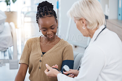 Buy stock photo Blood pressure, hypertension and doctor with black woman in hospital of healthcare, consulting and clinic services. Medical worker check patient arm pulse, test and heart wellness of diabetes results