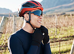 Face, helmet and cycling with a sports man outdoor for cardio or endurance exercise in nature. Fitness, safety and sunglasses with a male cyclist or athlete outside for long distance training