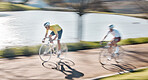 Fast, bike and men in competition, training and fitness for wellness, healthy lifestyle and freedom. Motion blur, male players and athletes cycling, competition and practice for victory and trail