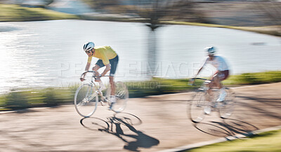 Buy stock photo Fast, bike and men in competition, training and fitness for wellness, healthy lifestyle and freedom. Motion blur, male players and athletes cycling, competition and practice for victory and trail