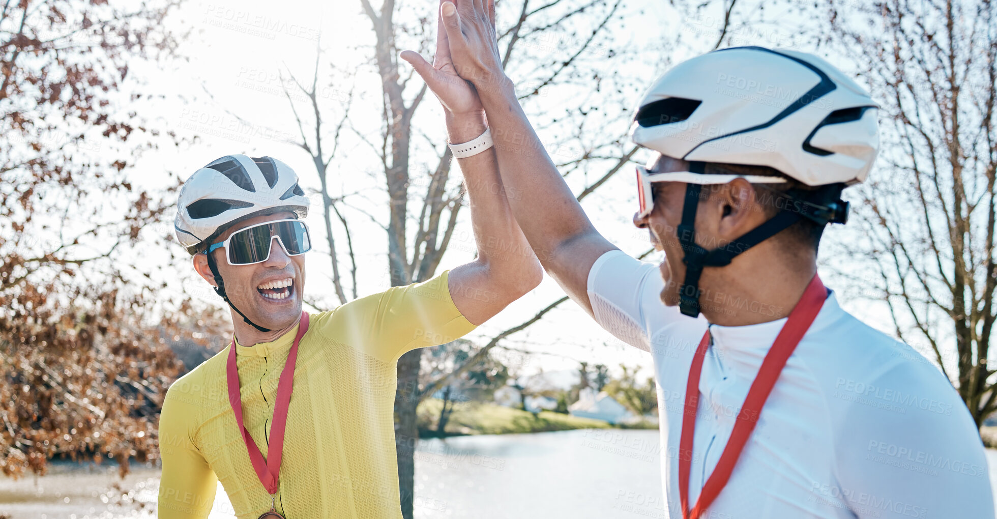 Buy stock photo Cycling men or friends high five for sports winning, marathon travel award and countryside competition or race success. Winner athlete or people in teamwork, triathlon journey goals and support hands