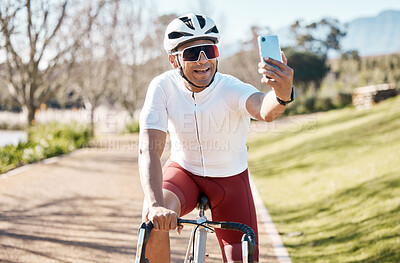 Buy stock photo Man on bike, selfie and smile, fitness and cycling in park, happy and helmet for safety, train for race outdoor. Cycling, bicycle and male athlete, exercise and smile in picture for social media post