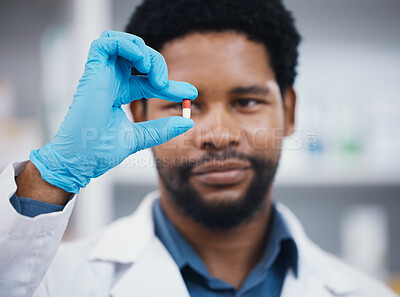 Buy stock photo Worker, pharmacist or holding medicine in research, medical healthcare or wellness innovation in retail store clinic or hospital study. Pharmacy, black man or employee and pills drugs or product help