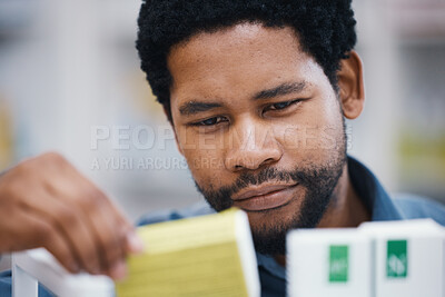 Buy stock photo Pharmacy, medicine and pills, black man and face, healthcare and prescription medication in drug store. Medical, closeup and pharmaceutical product for health, wellness and treatment with pharmacist